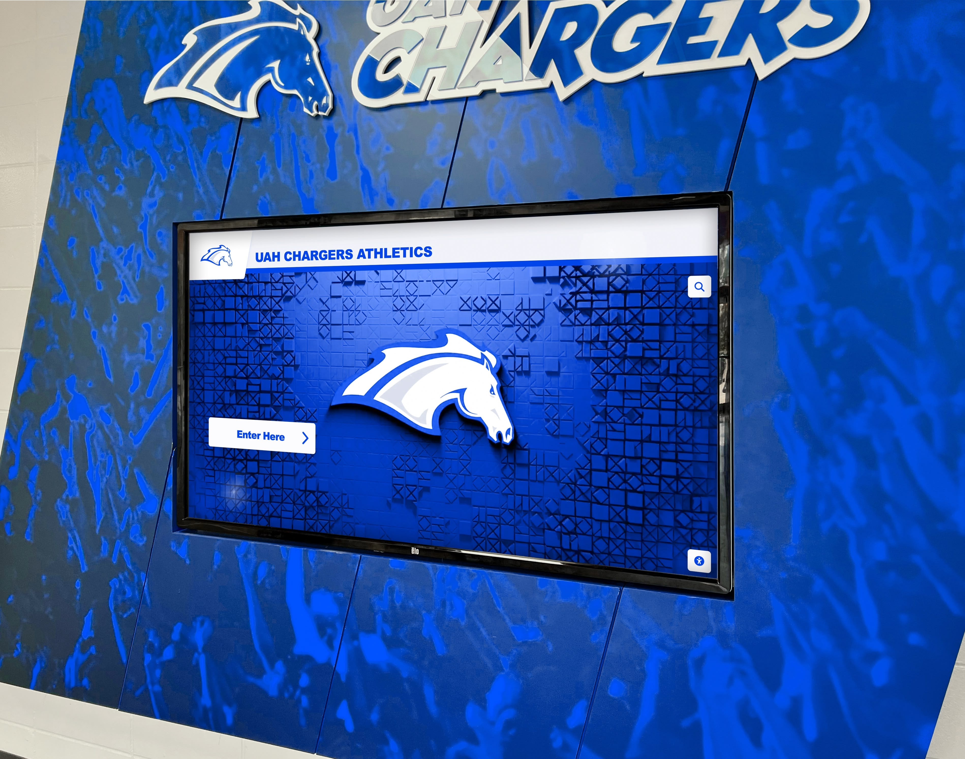 University athletic trophy display on digital screen showing championship achievements